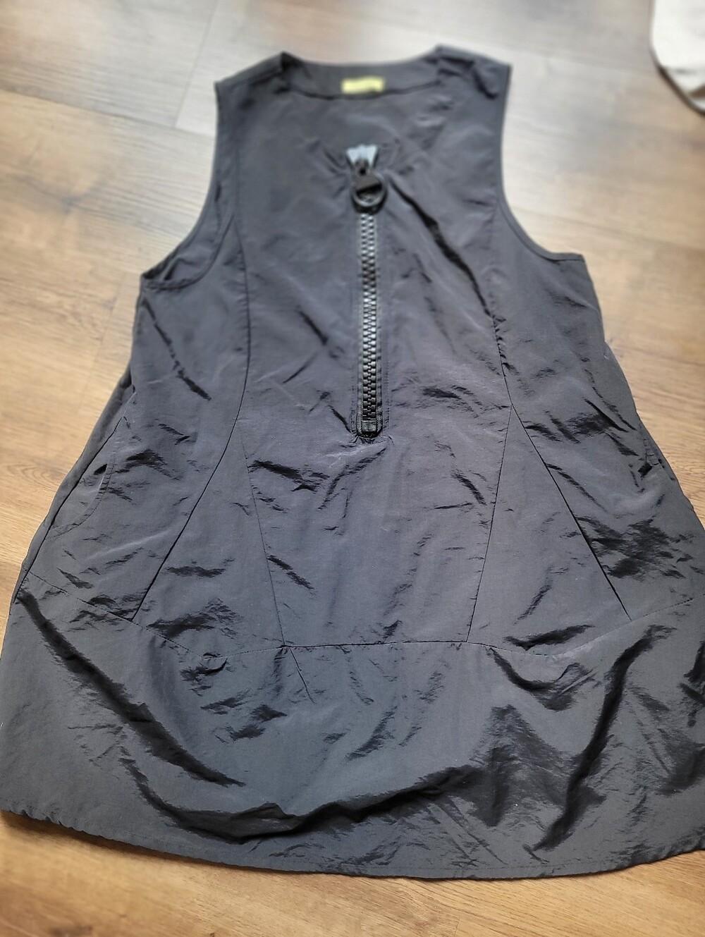 Nanae zippered sleeveless nylon dress.